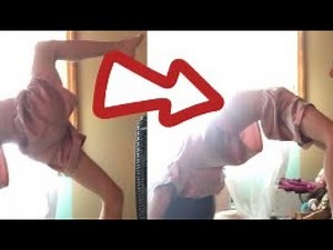 Teaching how to do a back walk over and a kick over!