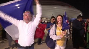 French soccer fans celebrate after beating Australia