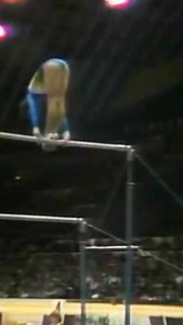 THE ICONIC KORBUT FLIP 🚨 Forty years after being banned from the Code of Points, the Korbut Flip remains one of the most impressive and renowned moves in the sport of gymnastics. At the 1972 Olympics, Olga Korbut stood on top of the high bar and, with barely a moment to focus, fearlessly dove backward, re-grasping the same bar where her feet had been only seconds earlier. In that instant, the world witnessed the birth of a legendary skill that would be remembered for generations. Since the 80s