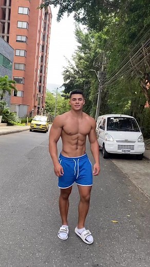 Young Muscle Hunk Showcases Impressive Physique