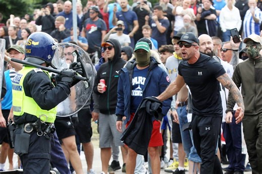 16 photos from Rotherham hotel riot as police corral protestors away from scene
