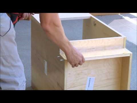 Assembly of a base sink cabinet