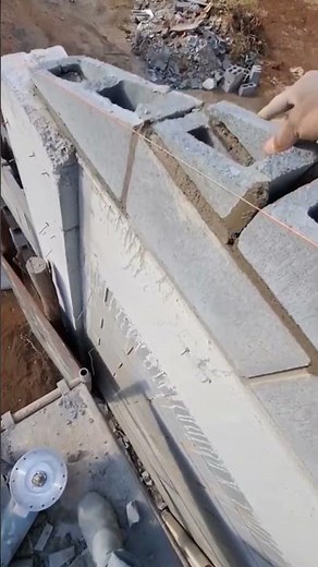 the process of installing triangular bricks to make a wall #construction #popular #brick #wall