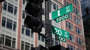 I street NW and 20th street NW street signs in downtown Washington DC symbolizing lobbying and corruption in nations capital