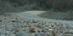 Teens find woman’s body in tote box on side of road