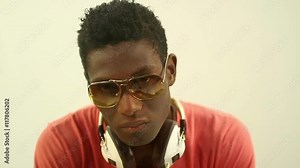 super cool young guy dances and poses