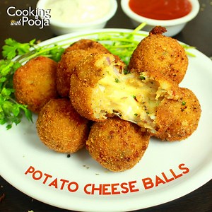 Learn how to make Potato Cheese Balls. This Yummy Mozzarella Stuffed Potato Balls Recipe will definitely make its way to your heart. Click to Full Recipe : https://goo.gl/J1OoZk | Cookingwithpooja