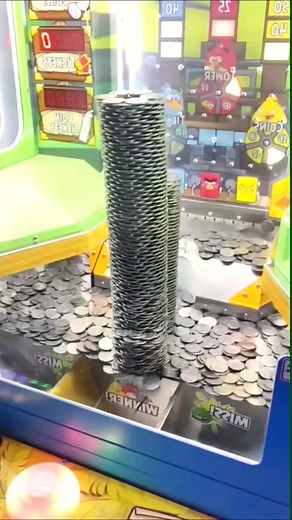Coin Pusher Machine: Watch Coins Cascade Down