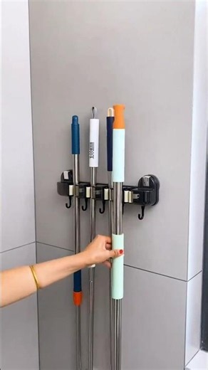 Wall mounted suction cup holder rack for broom mop holder online available on Amazon Flipkart