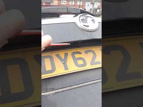 fixing vauxhall insignia sports tourer estate tailgate boot - opening switch replacement (video 1/3)