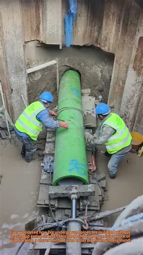 Pipe Installation: Guiding a Large Pipe into Place 🛠️