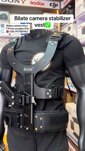 camera stabilizer vest is a wearable support system you put on your body that works with a spring-loaded arm to help carry and stabilize a camera rig or handheld gimbal. It distributes the weight of the camera and stabilizer from your arms to your torso and hips, so you can shoot for longer with less fatigue and get smoother footage, especially during walking or moving shots. The spring arm absorbs vertical motion and shock, making your shots appear steadier and reducing shake compared with hold