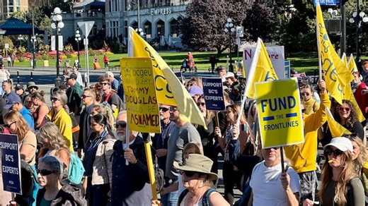 Striking BCGEU members march in Victoria as legislature opens