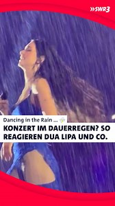 Welches Konzert im Regen ist euch in Erinnerung? ⛈️ Ganz ehrlich, das ist doch irgendwie magisch, oder? Arm in Arm mit den Liebsten, die Lieblingssongs mitsingend und der Regen prasselt dir ins Gesicht … Aktuell fallen jede Menge Konzerte wortwörtlich ins Wasser. Aber: Bei Das Fest haben wir uns davon nicht die Stimmung verderben lassen und auch Robbie Williams und Dua Lipa nehmen den Regen eher als Chance zur Party. Und auch Justin Timberlake lässt sich zum Schluss noch überzeugen ... | SWR3