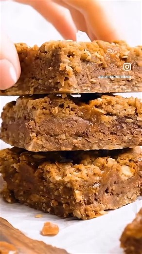 Sandy Coughlin on Instagram: "Football! 🏈🏈🏈 CARMELITAS! ➡️ comment “recipe” or tap link in bio https://reluctantentertainer.com/carmelitas/ #carmelitas #footballtreats #reluctantentertainer #footballeats #caramellovers😋❤️"