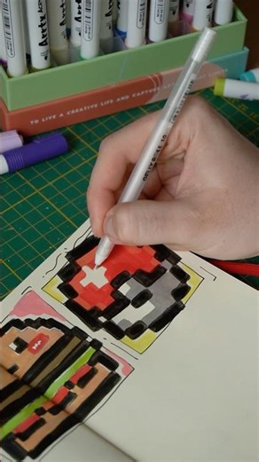 Drawing pixel pokeball with acrylic markers