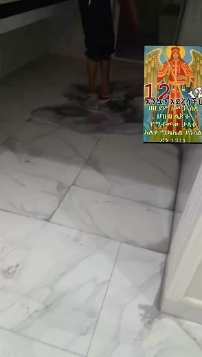 Religious Icon of an Angel: Intricate Red and Gold Design