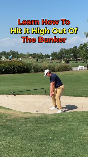 Hit It High Out Of The Bunker! Struggling to hit it high out of the bunker? Here are a few tips on how to accomplish this shot. The first step is the set up, you need to set up with a wide open clubface, adjust your stance so the clubface points at the target, and get those hands low. Next you want to think about your motion through the golf ball. You need to retain this loft through impact and releasing the club with the clubface pointed to the sky is the best way to do this. Finally, you need