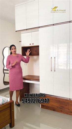 Master bedroom with a ceiling-to-floor laundry unit, smartly designed to utilize maximum wall space.