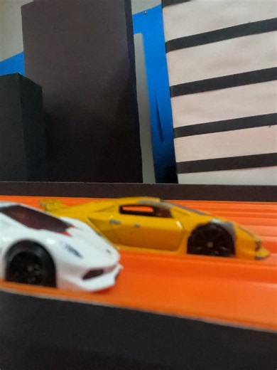 Big City Streets Racing in all 8 Lanes on the Big City Streets with the Hot Wheels Lamborghini Sesto Elemento Cars showing Top Speeds unlimited! These two cars came ready to answer the question as to which is the fastest as they fly through the 3 simultaneous uniquely elevated high banked curves only to stop after crossing the Finish Line! Prepare to see some of the best Head to Head racing ever recorded on the internet as they prepare for the next challenge! #viralvideo #toycars #fy #hotwheelsr