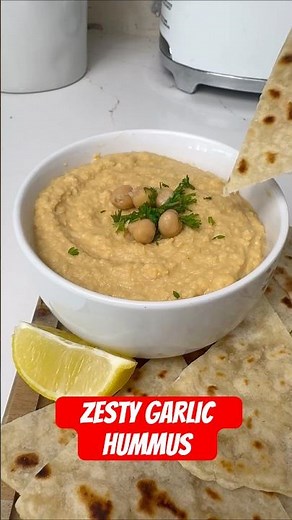 Creamy, zesty hummus — no tahini needed! #HomemadeHummus #LemonGarlic #EasyRecipes