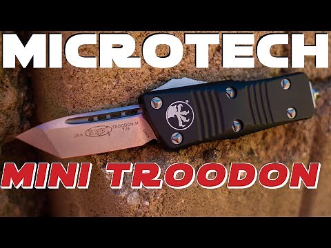 Mini Troodon vs the UTX 70! Microtech battle!