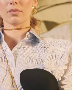 20K views · 1.8K reactions | The Jungle theme permeates the #VersaceSS20 show, with a bronze palm tree sculpture featured prominently on the runway. The tropical design is presented also as subtle appliqué on striped cotton shirts. #MFW | Versace | Facebook