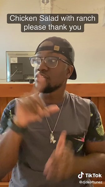 Dre Robinson (@djdeaftunez) - Learn How to Sign 'Hotdog' in American Sign Language