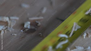 Marking yellow tape measure closeup footage. Joiner's works. Carpenter in the process. Super slow motion measuring tape