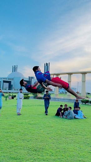 Exciting Acrobatic Stunts in a Scenic Outdoor Setting