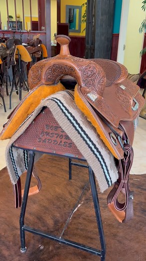 3.6K views · 75 reactions | Check out this Fappani model at Cowdog Saddles! B23-324 is a 16 1/2” tan bison seat. It is full extra small basket stamped with free flowing Scottsdale tooled corners. It has the 2301 Abilene conchos with matching rear dee, and is finished in the antique light oil. #cowdogsaddles #rideabobs #fappanisaddle #teambobs #bobsnation #bobscustomsaddles #reining #reiningsaddle #reiningshowsaddle #showsaddle #nrha | Bob's Custom Saddles | Facebook