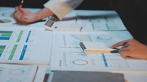 Business Documents, Auditor businesswoman checking searching document legal prepare paperwork or report for analysis TAX time,accountant Documents data contract partner deal in workplace office