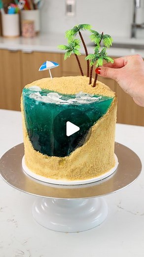 Chelsey White on Instagram: "All this sunshine calls for a beach-inspired cake!! 🏝️ Absolutely loved making this cake for @foodnetwork!! The recipe & tutorial are linked in my bio or you can google chelsweets beach cake 🤗 #beach #jelly #cake"