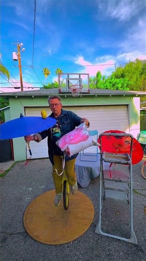Bike minus one wheel #circus #funny #tricks #comedy #skills #unicycle #cirque #parasol #fun