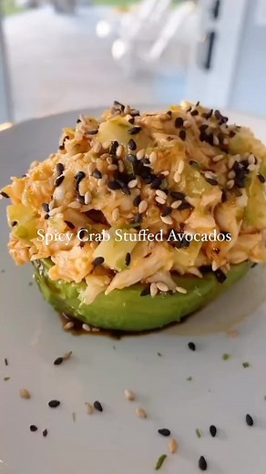 Gina Homolka - Healthy Recipes on Instagram: "All the flavors of a Spicy California roll without the rice! These spicy Crab Stuffed Avocados are filled with lump crab, cucumbers and spicy mayo topped with furikake and drizzled with soy sauce. SO GOOD!! 4 WW pts 194 Cals 12 Protein 7 Carbs 13 Fats (per half) INGREDIENTS 2 tablespoons light mayo, I used Hellmans *for whole30 use compliant mayo 2 teaspoons sriracha, plus more for drizzling 1 teaspoon chopped fresh chives 4 oz lump crab meat 1/4 cup