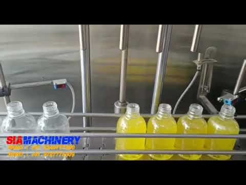 AUTOMATIC BOTTLE FILLING MACHINE