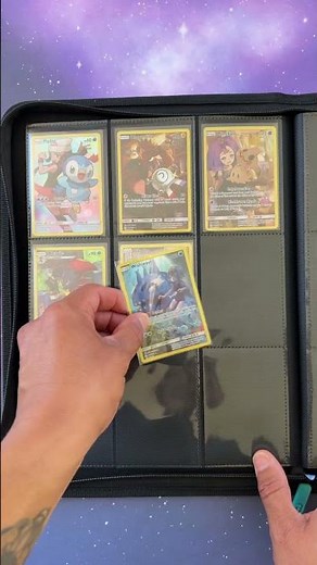 Building a themed Pokémon binder page featuring Cosmic Eclipse Secret Rare cards.