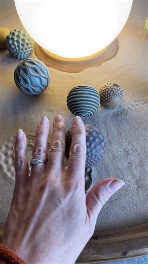 959K views · 3.2K reactions | Market days are the best! I’m here for the sensory play in the sand . We love selling these sets live, because people get to try everything out and pick out a Wonderscape sand garden that is uniquely their style. Here, I’m playing with our Seeds sphere. The textures it makes are so satisfying. #satisfying #mesmerizing #sand #market #texture | Olander Earthworks | Facebook