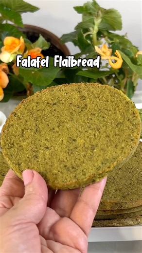 Falafel is a classic Middle Eastern favorite made with chickpeas, herbs, and spices, usually shaped into balls and fried until crispy. In this recipe, falafel becomes the bread itself, baked into flavorful, gluten-free flatbreads that make the perfect base for fresh, vibrant toppings like hummus, avocado, tomatoes, and tahini. Ingredients: 1 cup (180 g) dried chickpeas, soaked (or 2 cups soaked chickpeas) 85 g onion, chopped 2 garlic cloves 50 g fresh parsley 3 tbsp. olive oil 1 tsp. salt 1 tsp.