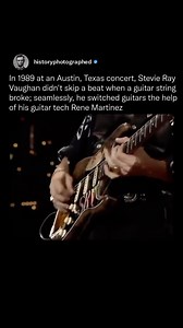 6.5M views · 55K reactions | Stevie Ray Vaughan, known for his incredible guitar skills, showed his mastery during a 1989 concert in Austin, Texas. When a guitar string broke mid-performance, Vaughan didn’t miss a beat. With seamless coordination, his guitar tech, Rene Martinez, stepped in to help him switch guitars. | History In Pictures | Facebook
