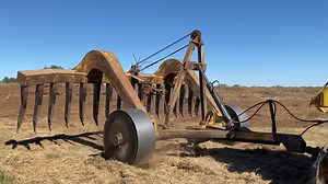 The internet dilemma ! Difference between a rake and Stacker or Stacking Rake. A Rake is pulled from behind and is used to make windrows as seen in this video this is a Rake or better known as a Wheel Rake but it’s a rake. A Stacker or Stacking Rake is on the front of a dozer and is used to stack material that has been windrowed into piles for burning. If it’s pulled from behind it’s rake and if it’s being pushed it’s a Stacker. While technically you rake with a stacker its main purpose is to st