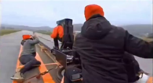 Falling off an 8-story building, you'd hit the ground at 80 km/h. This guy got launched off a truck at that speed and walked away.The math is dead simple. The truck goes forward at 80 km/h, and the launcher fires you backward at the exact same speed. 80 minus 80. Zero. You drop straight down like hopping off a step.Galileo figured this out in 1632. He said that if you drop a ball from the top of a moving ship, it lands at the base, not behind it. Because the ball was already moving with the ship