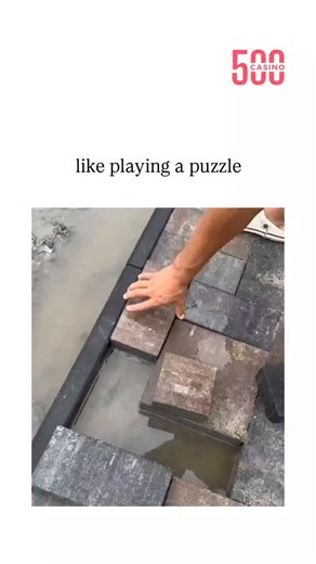 galaxy_decodee on Instagram: "The post showcases a 48-second time-lapse video of a worker assembling irregular natural stone pavers on a wet mortar base, tapping them into place like puzzle pieces, captioned "like playing a puzzle" to emphasize the engaging process. From Indonesian creator @uda_topik , known for casual positive content, it exploded to 2.6 million views and 1,000+ likes in under 24 hours, sparking 180 replies mostly in Indonesian noting its satisfying, reversible nature for repai