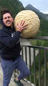 20M views · 359K reactions | WORLD RECORD Bounce? Giant Rubber Band Ball 165m Drop | How Ridiculous | Facebook