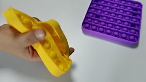 Watch big size pop its fidget toy yellow and purple square on Amazon Live