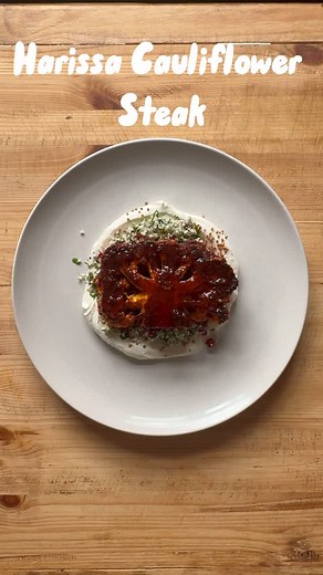 Kieran McDonnell on Instagram: "Harissa Cauliflower Steak The harissa and caramelised shallot butter glazing the cauliflower is a wonderful thing. Fresh, zingy, and with a bit of heat. It’s an elegant way to treat a vegetable and I hope you enjoy it. #harissa #cauliflower #vegetarian #plateup"
