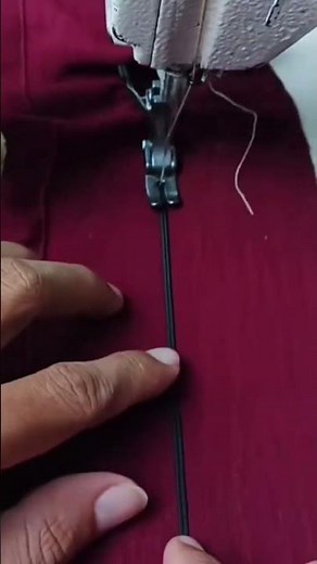 The process of sewing a fabric using a special machine with a neat result