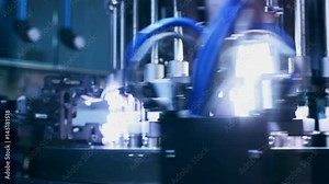 Medical ampoules quality control. Pharmaceutical vials quality control machine. Pharmaceutical manufacturing line. Pharmaceutical industry equipment. Pharmaceutical machine at medical factory