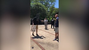 Former judge throws a punch at anti-racism protester in Chicago