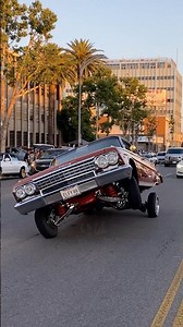 1962 Chevy Impala LOWRIDER TIPPING IN 3 WHEEL MOTION! Classic Car cruising Van Nuys Blvd, California